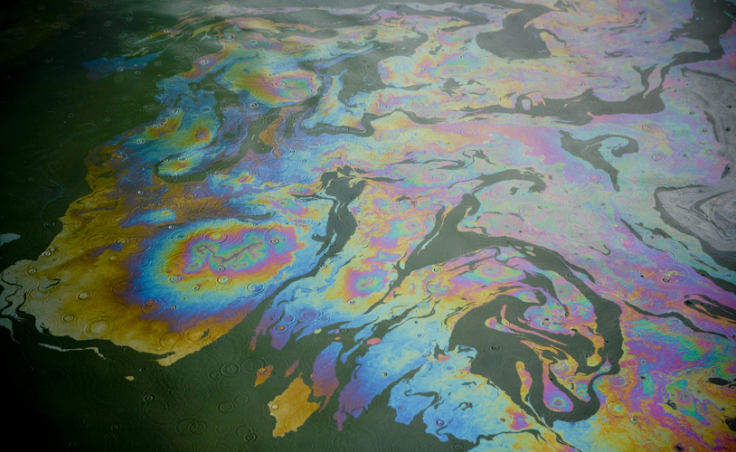 Oil spill on the water surface